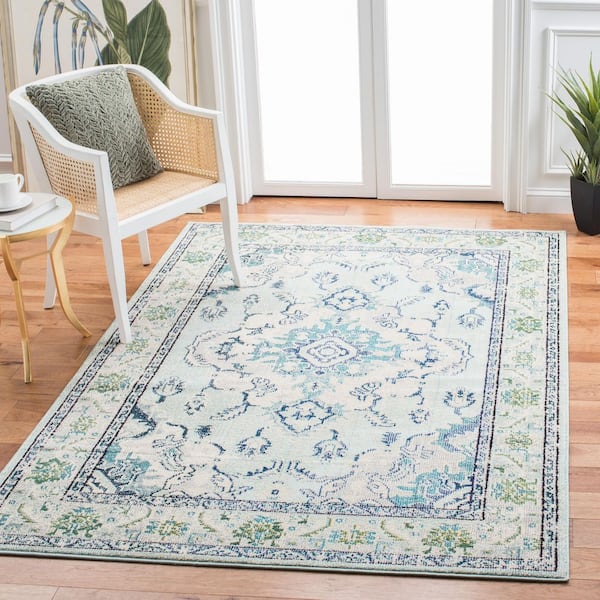 Monaco Light Blue/Ivory 5 ft. x 8 ft. Distressed Border Medallion Area Rug