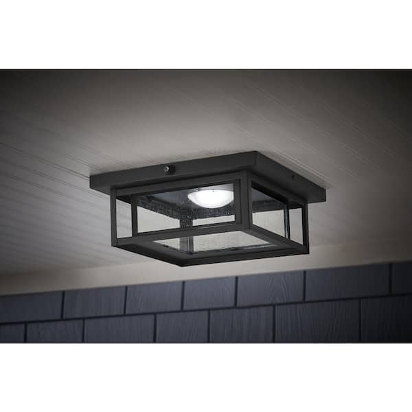 Home Decorators Collection Mauvo Canyon 12 in. Black Dusk to Dawn Integrated LED Outdoor Ceiling Light Flush Mount Fixture with Seeded Glass
