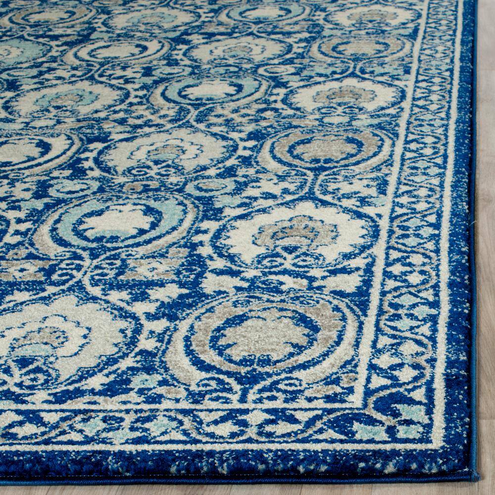 Blue and Ivory Floral High Pile Synthetic Area Rug 8' x 10'