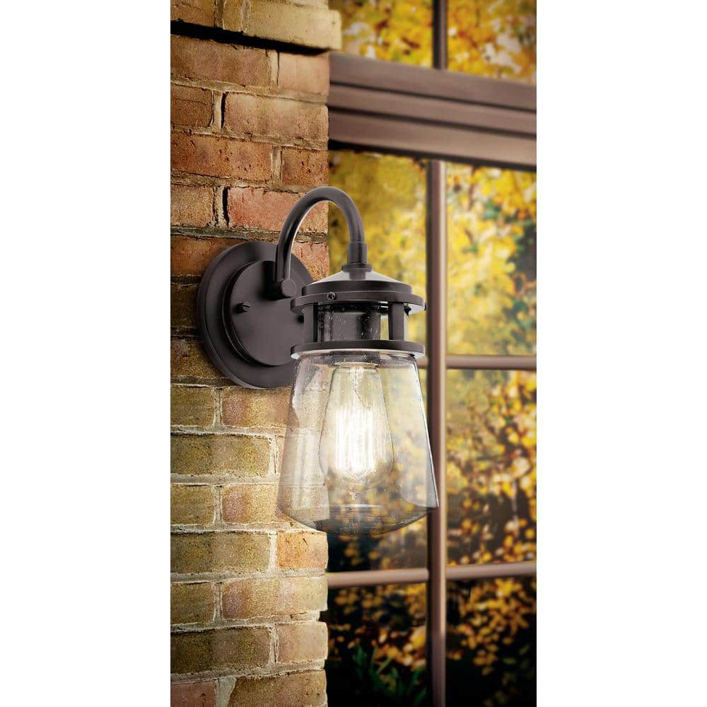 Lyndon 11.25" Bronze and Clear Seeded Glass Wall Sconce