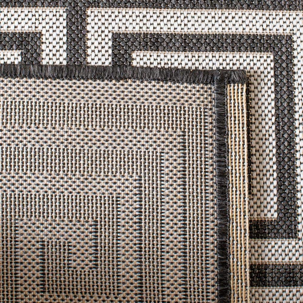 Light Grey and Charcoal Geometric 8' x 10' Synthetic Area Rug