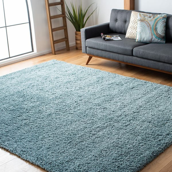 California Shag 10 ft. x 13 ft. Light Blue Solid Flokati Area Rug