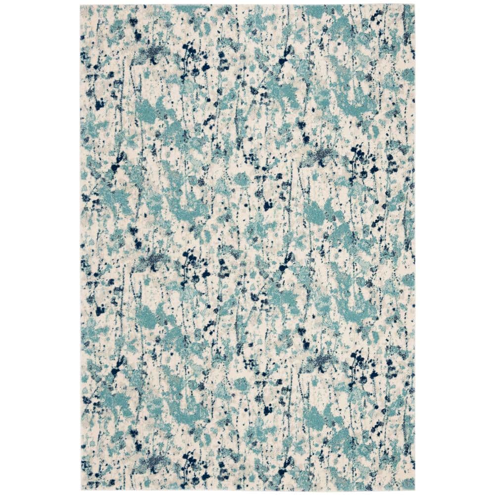 Ivory and Blue Abstract Floral 8' x 10' Area Rug