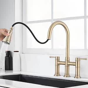 Double-Handle 360-Degree Swivel Spout Bridge Kitchen Faucet with Pull-Down Spray Head and 3 Modes in Brushed Gold