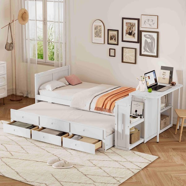 White Wood Frame Twin Size Platform Bed with Desk and Storage Shelf at the End of the Bed
