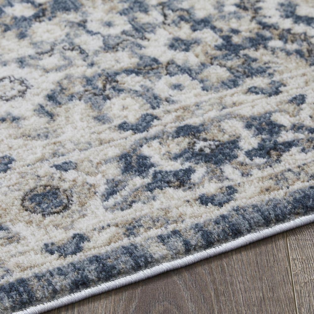 Rectangular 9' x 12' Blue Floral Synthetic Area Rug