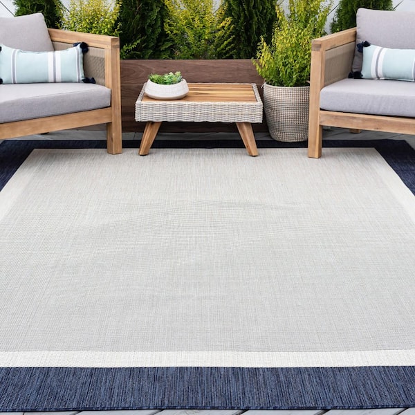 Eco Solid Border Navy 8 ft. x 10 ft. Indoor/Outdoor Area Rug