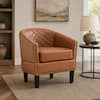 Accent chair in a bright room with decor elements.