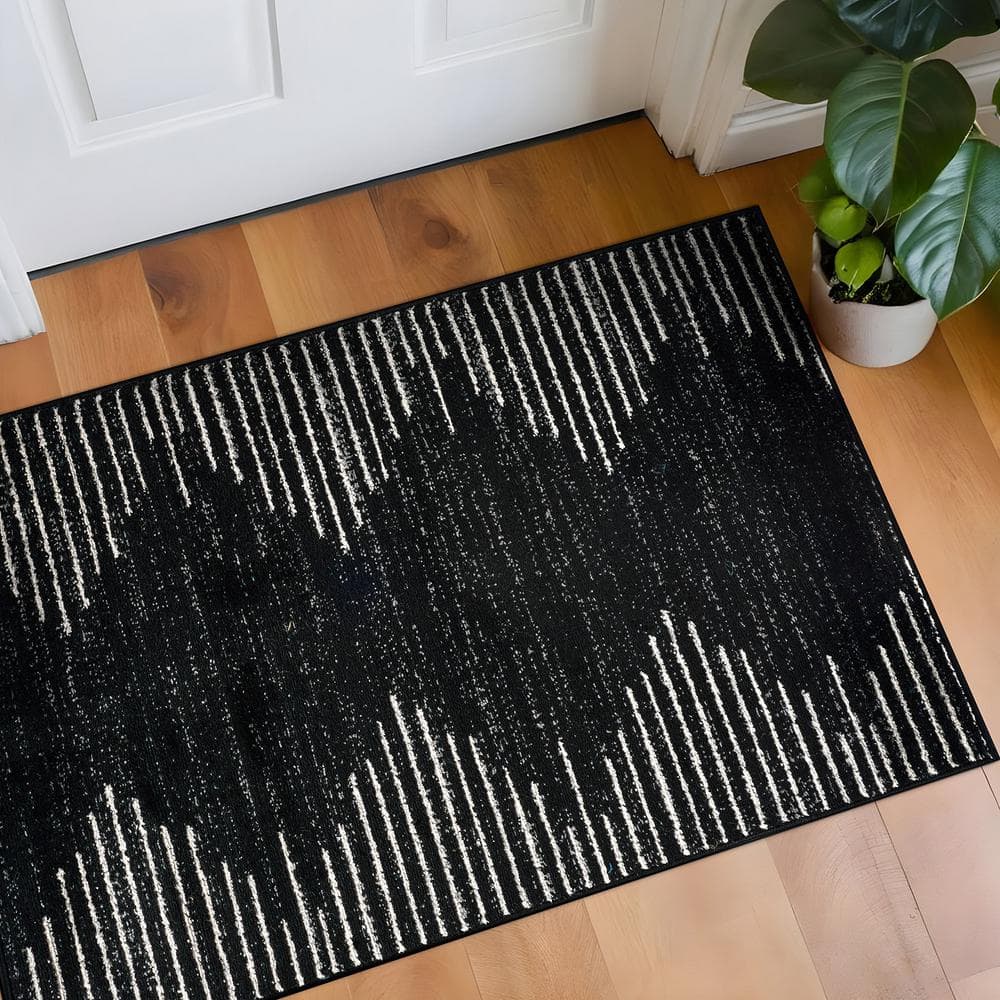 Black and White Striped Synthetic Indoor Area Rug 2' x 3'