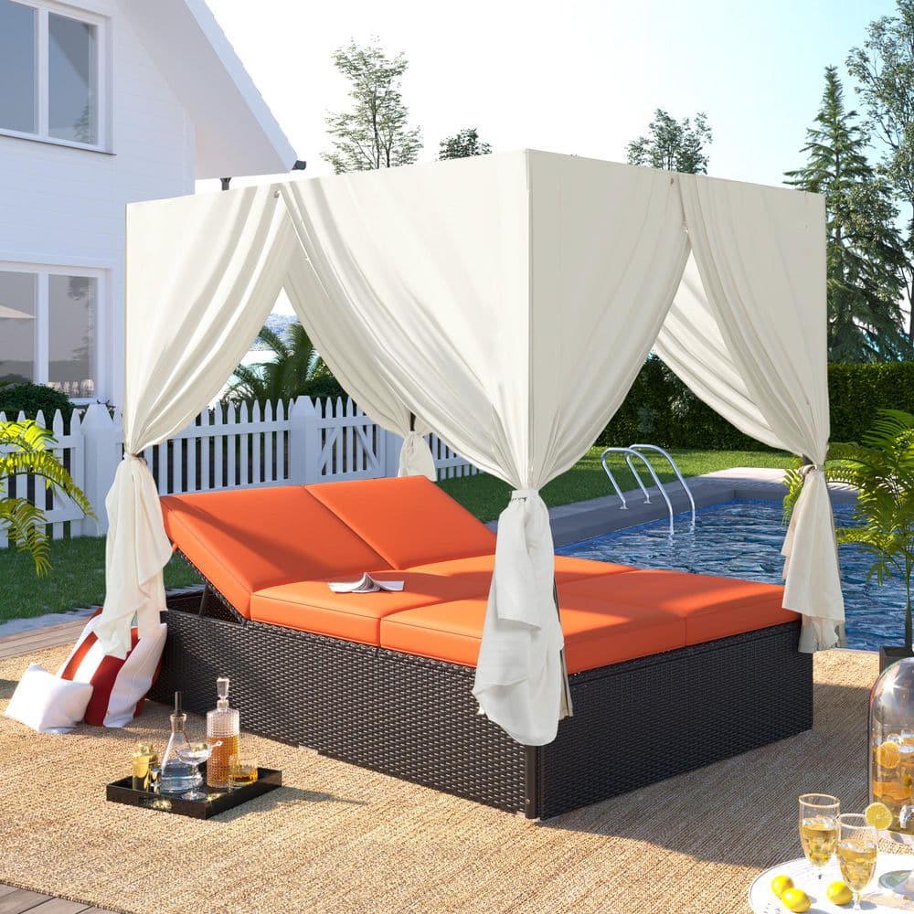 Brown Metal Outdoor Day Bed with Orange Cushions and Beige Curtains with Adjustable Backrest