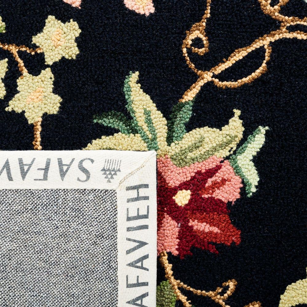 Handmade Black Floral Wool Accent Rug 2'6" x 4'