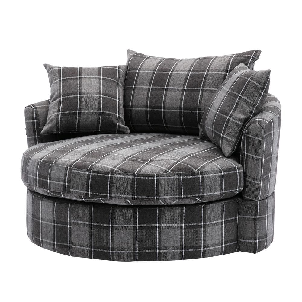 A charcoal gray striped lumbar pillow sits atop a wood and wicker accent  chair positioned at the corner of a white and gray…