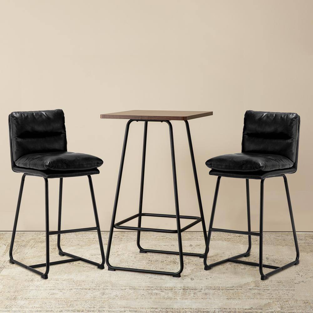 Pub table set with a square walnut veneer top and two black leatherette bar stools.