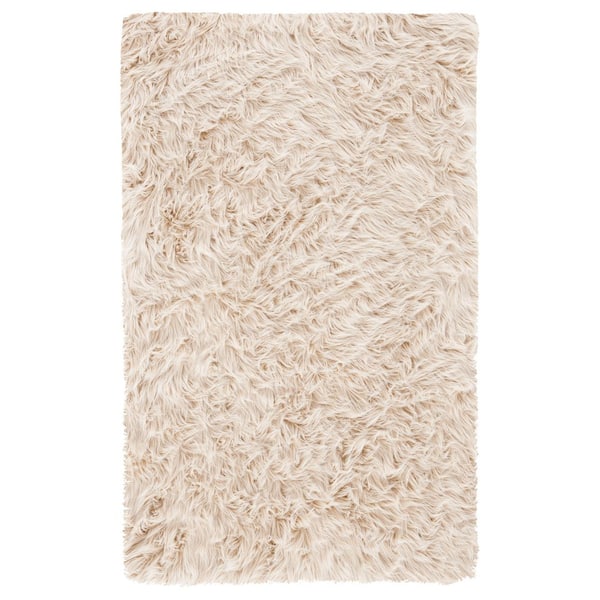 Faux Sheep Skin 2 ft. x 3 ft. Beige Gradient Solid Color Area Rug