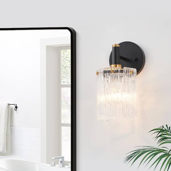 1-Light Painted Black and Plated Brushed Gold Wall Sconce with Textured Glass Shade