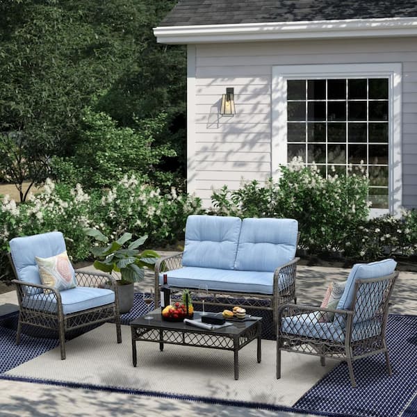 Cesicia 4-Piece PE Rattan Wicker Patio Conversation Set with Coffee Table and Blue Cushions