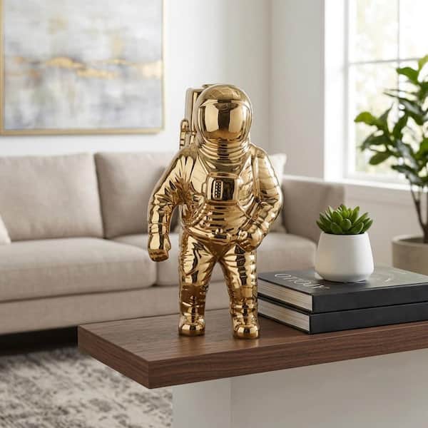 Liv & Skye Gold 6 in. x 11 in. Ceramic Astronaut Contemporary