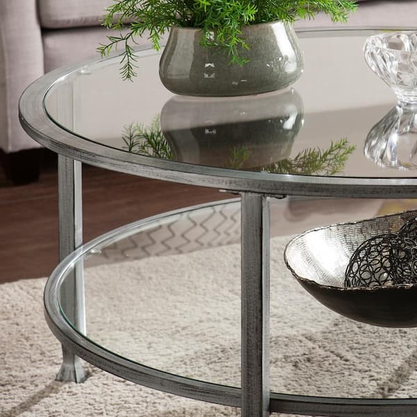 https://images.thdstatic.com/productImages/93d4574c-5312-42bd-96b6-e51789d7fc5c/svn/metallic-silver-southern-enterprises-coffee-tables-hd748337-c3_600.jpg