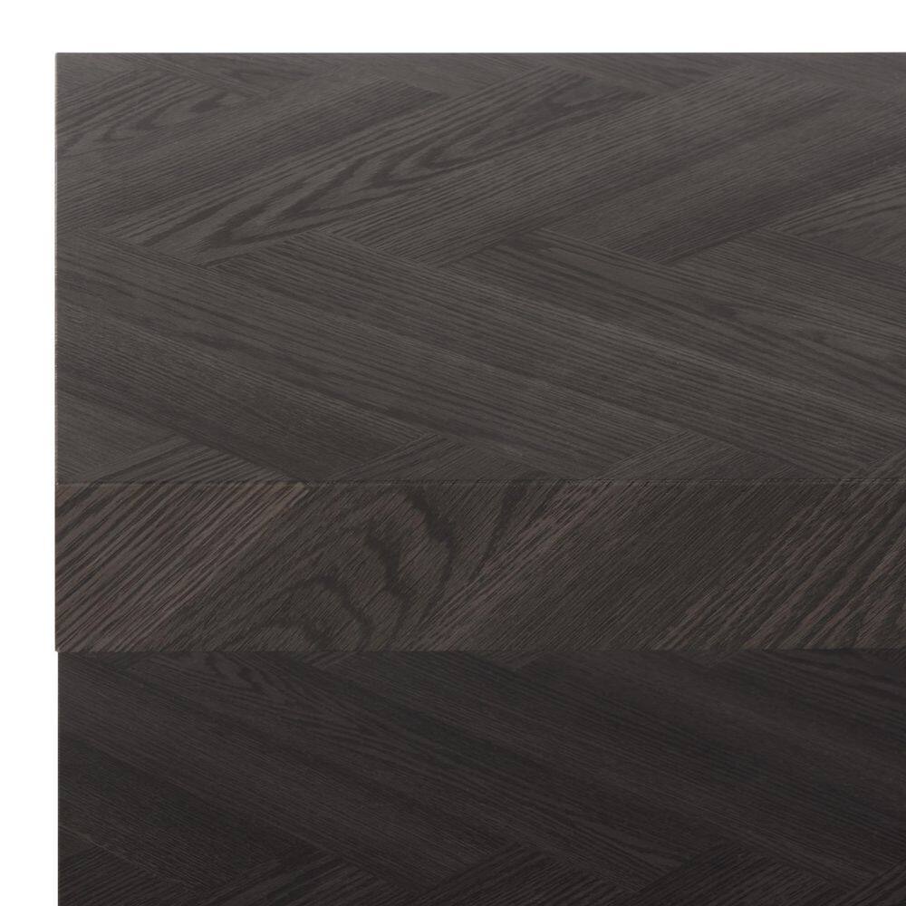 Close-up detail of the wood grain texture on the coffee table side.