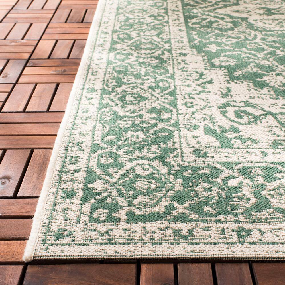 Green and Creme Medallion Synthetic 9' x 12' Tufted Area Rug