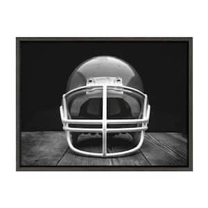 Sylvie "Vintage Football Helmet on Black" by Saint and Sailor Studios Sports Framed Canvas Wall Art 24 in. x 18 in.