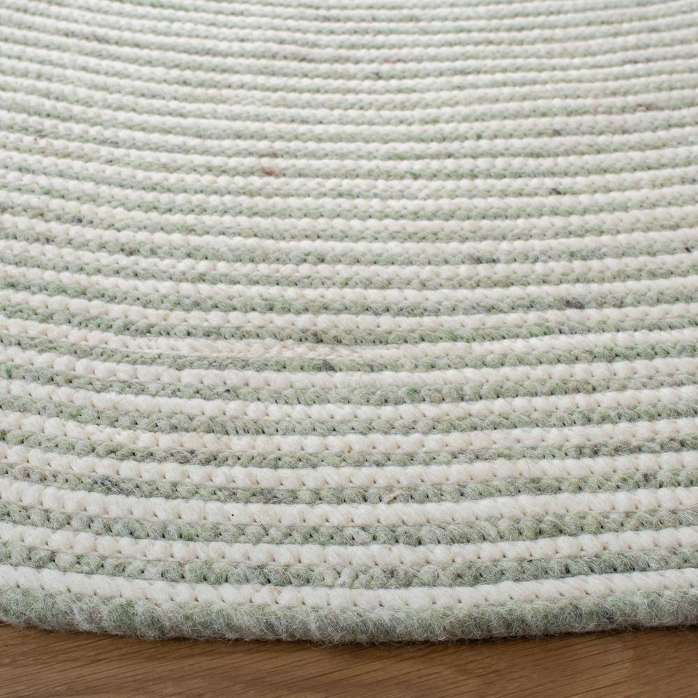 Handmade Ivory and Green Braided Wool Round Rug, 4' x 4'