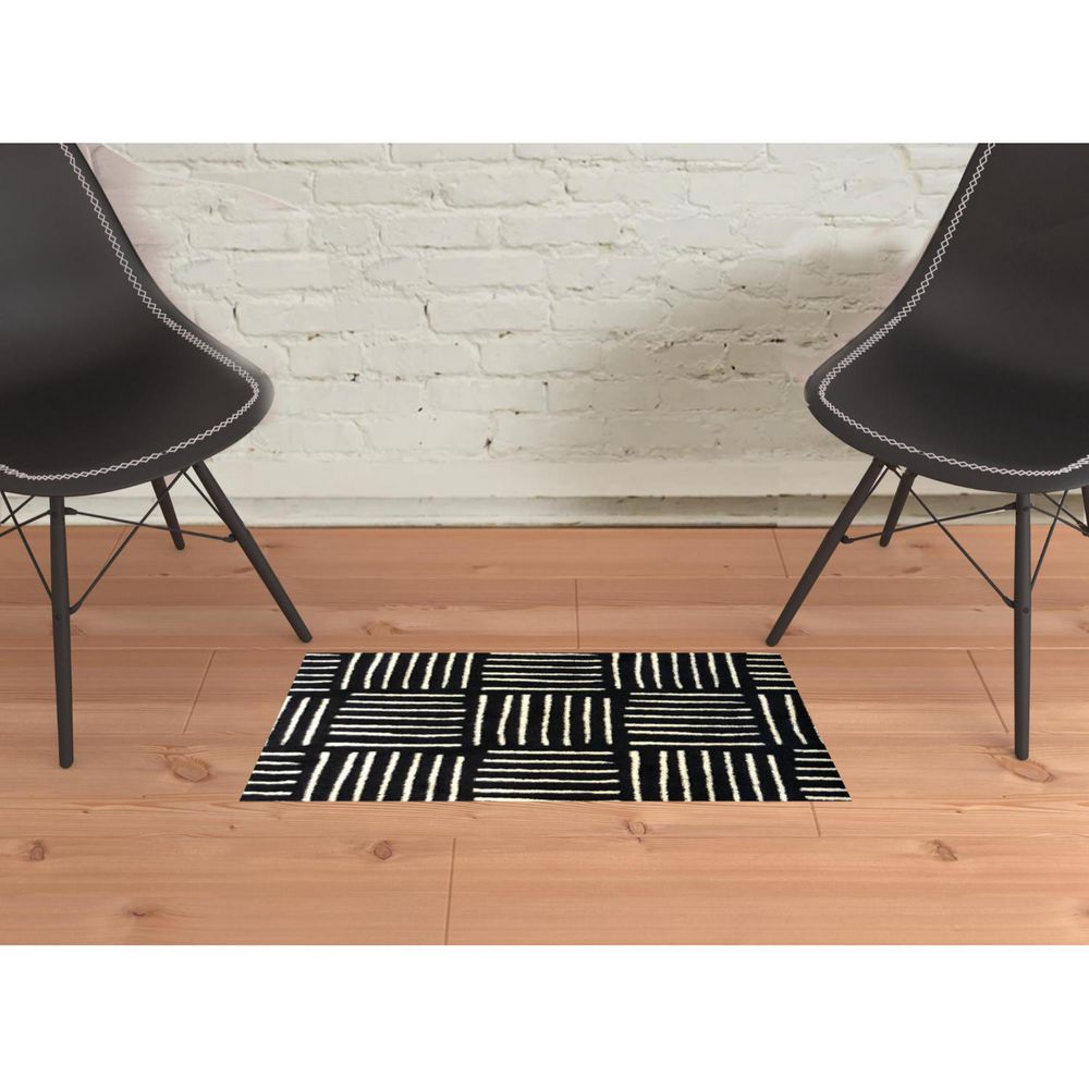 2 ft. x 3 ft. Black and Off White Abstract Machine Tufted Area Rug