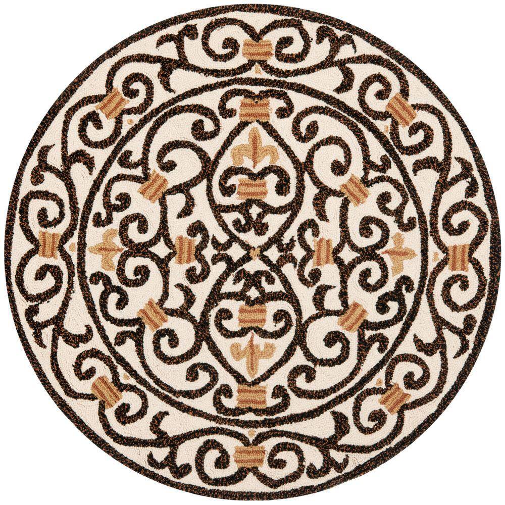 SAFAVIEH Chelsea Ivory/Dark Brown 4 ft. x 4 ft. Round Border Area Rug 100% pure virgin wool pile, hand-hooked to a durable cotton backing. American Country and turn-of-the-century European designs. This collection is handmade in China exclusively for Safavieh. This is a great addition to your home whether in the country side or busy city. Color: Ivory/Dark Brown.