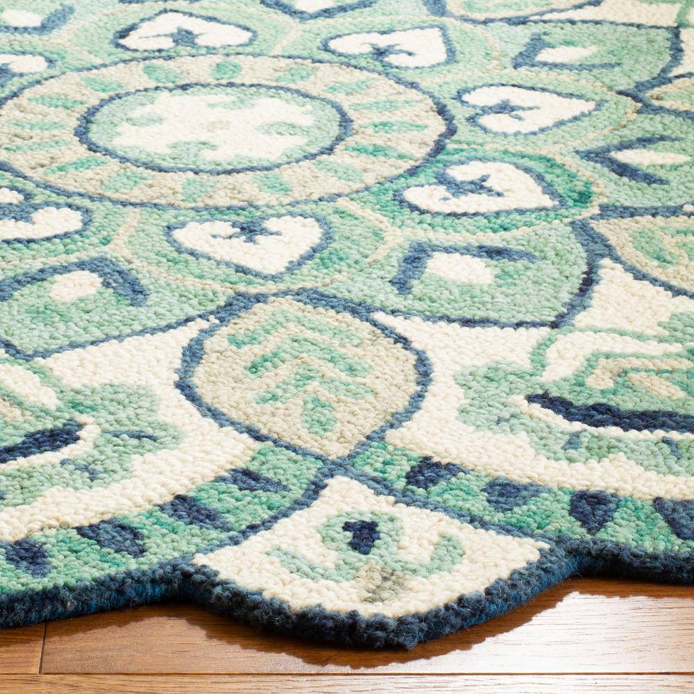 Handmade Floral Bliss Round Blue Wool Area Rug - 47"