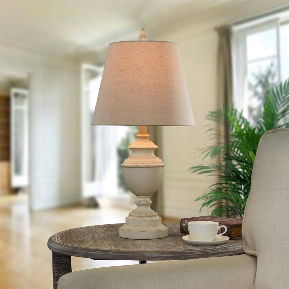 Distressed Cream Polyresin Table Lamp with Fabric Shade, 24" Height