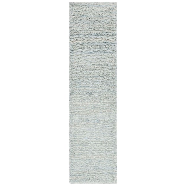 Casablanca 2 ft. x 9 ft. Light Blue Solid Color Flokati Runner Rug