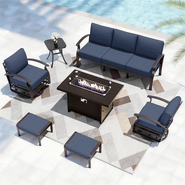 7-Piece Aluminum Patio Conversation Set with 2 Swivel Rocking Chairs, 2 Ottomans, a Fire Pit Table and Navy Cushions