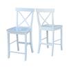 Two white counter stools side by side.