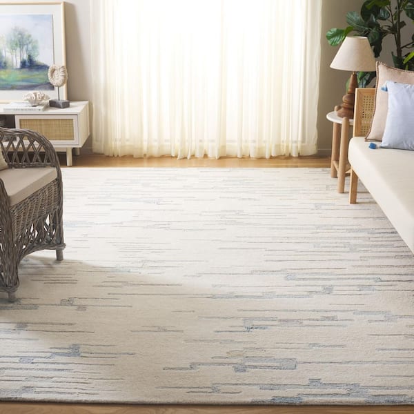 Renewal 8 ft. x 10 ft. Ivory/Light Blue Abstract Area Rug