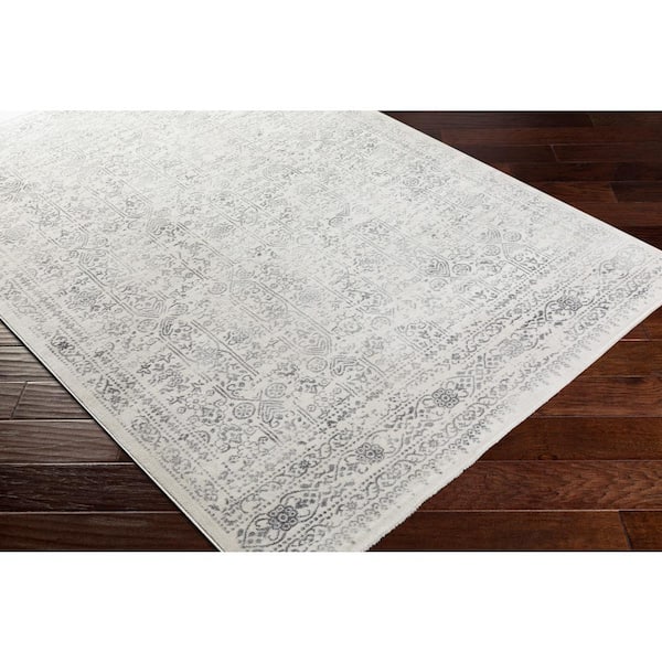 Errol Cream 9 ft. x 12 ft. 3 in. Distressed Oriental Area Rug