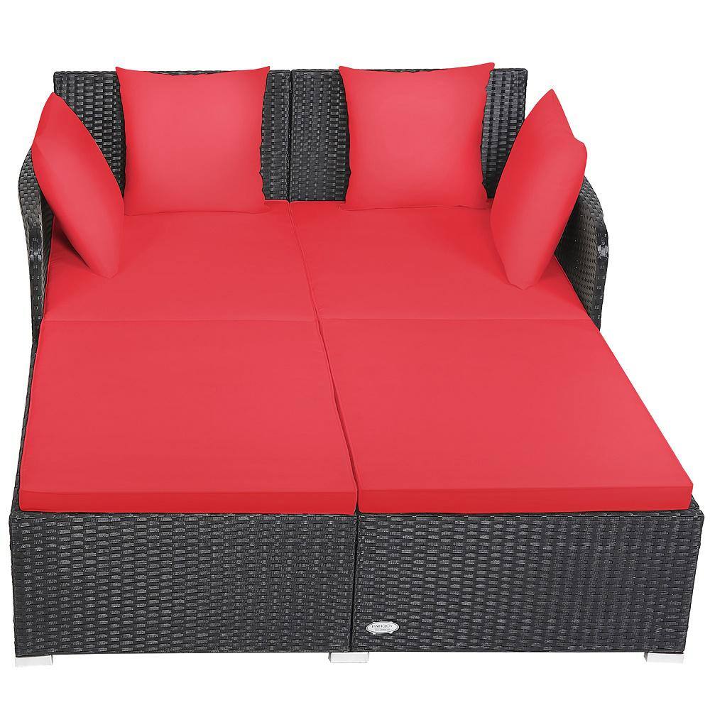 Outdoor Black Rattan Daybed with Red Cushions and Pillows