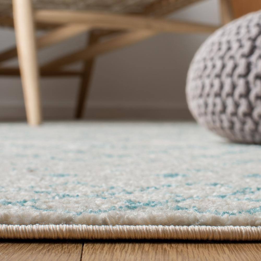 Ivory and Aqua Hand-Knotted Synthetic Area Rug