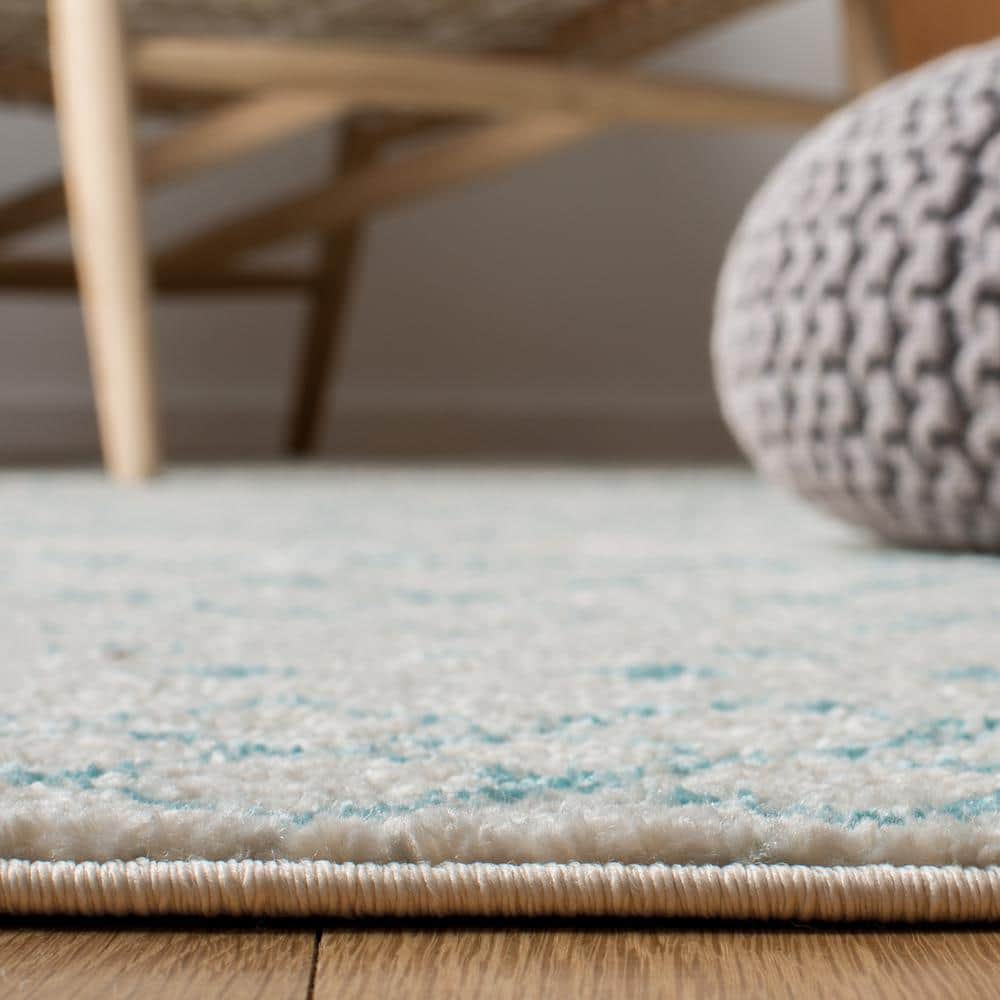 Elegant Ivory/Aqua Synthetic 9' x 12' Hand-Knotted Area Rug