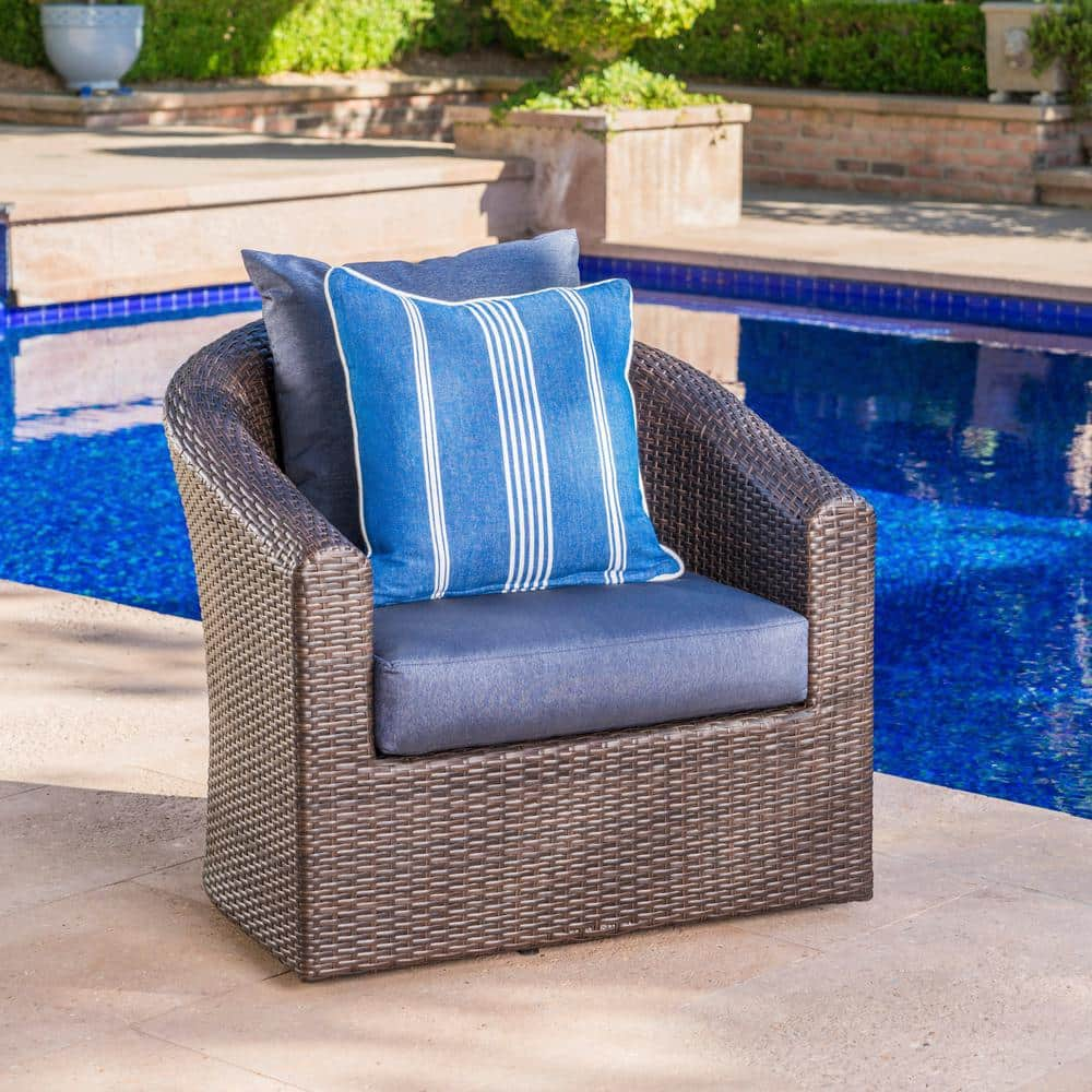 outdoor lounge chairs with blue cushions