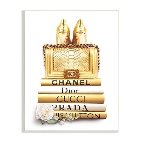 Stupell Industries "Divine Golden Fashion Purse on Designer Bookstack"by Ros Ruseva Unframed Abstract Wood Wall Art Print 13 in. x 19 in.