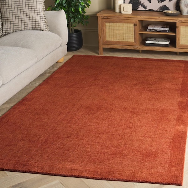 Mirage 9 ft. x 12 ft. Rust Solid Color Border Area Rug