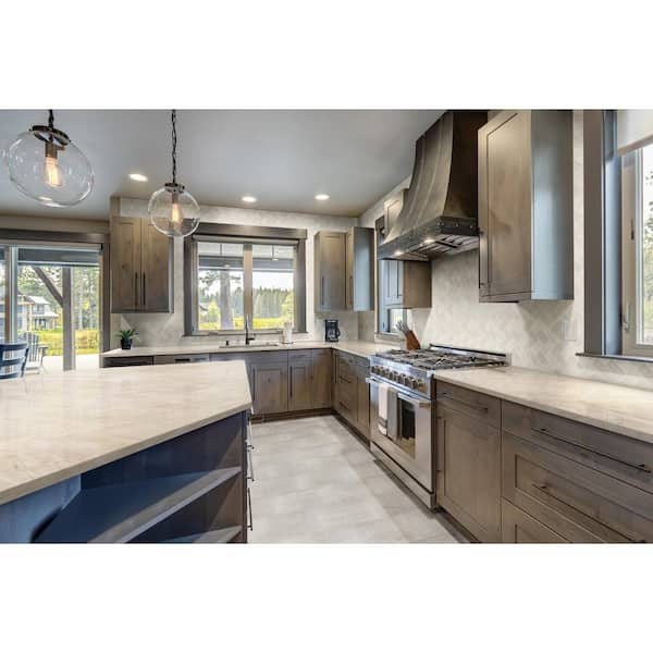 https://images.thdstatic.com/productImages/949eaa8e-a06a-4c3c-aeab-a1ab5880712e/svn/taj-mahal-stonemark-quartzite-countertops-dt-q705-c3_600.jpg