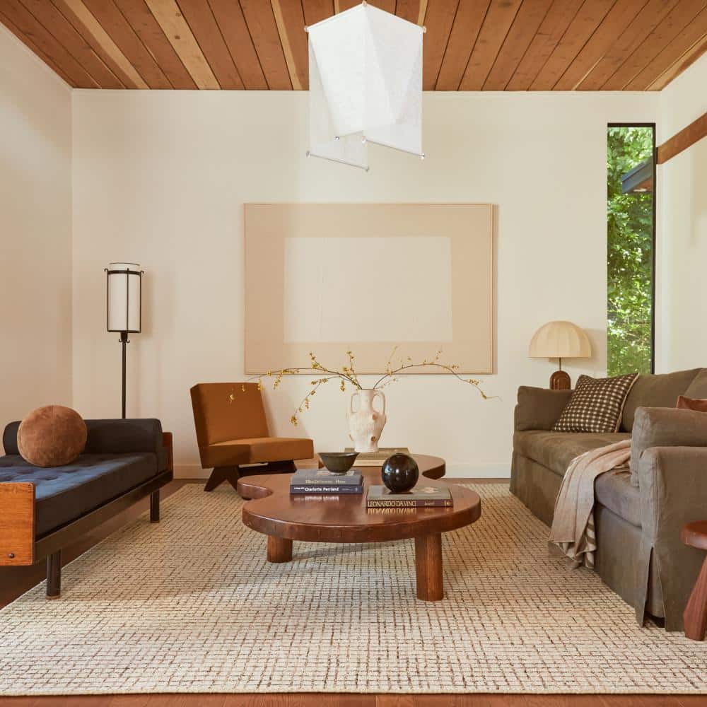 Cream and Beige Tufted Wool 6' x 9' Area Rug