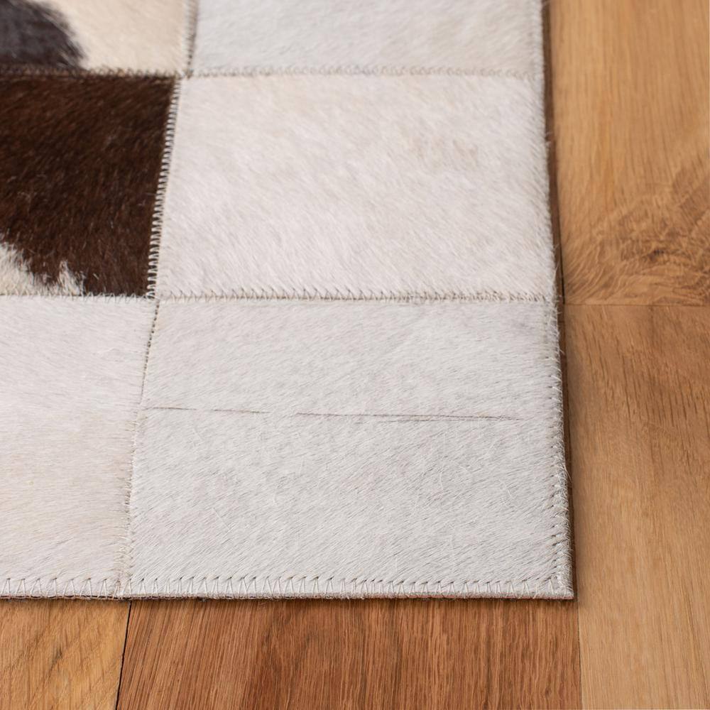 Artisan Ivory Geometric Hand-Stitched Cowhide 5' x 8' Area Rug