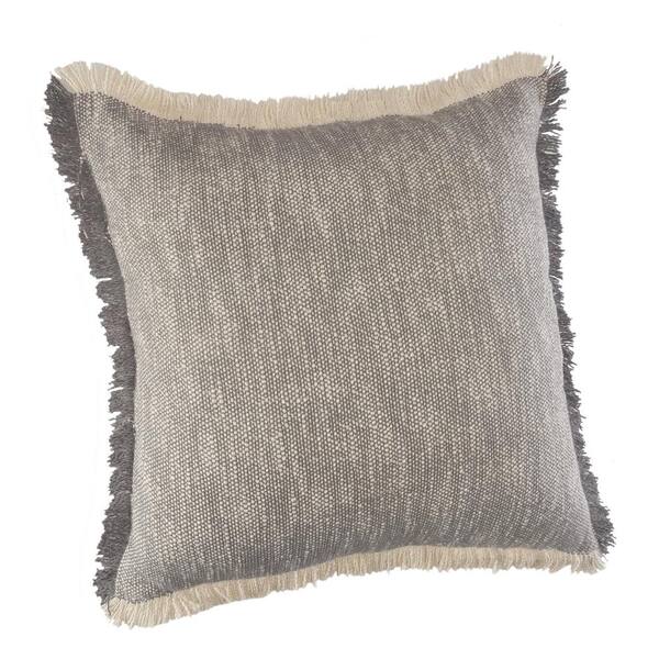 white fringe pillow