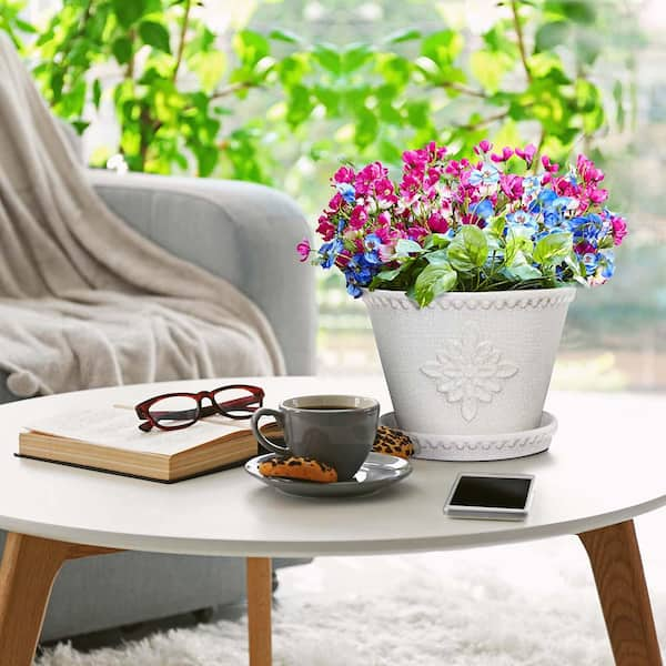 https://images.thdstatic.com/productImages/94c59488-62ab-46b3-b5af-20d88726e1b7/svn/pearl-white-southern-patio-plant-pots-crm-030928p2-fa_600.jpg