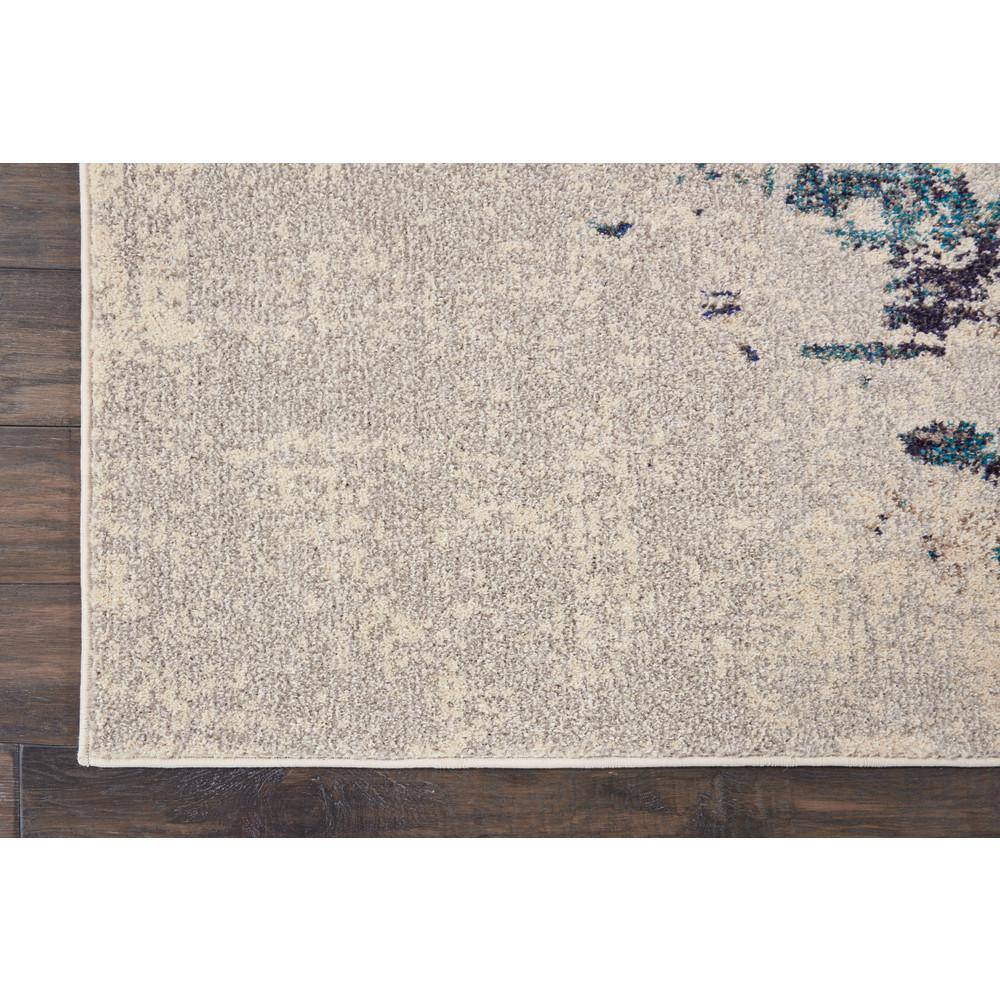 Abstract Blue and White Synthetic 5' x 7' Stain-Resistant Rug