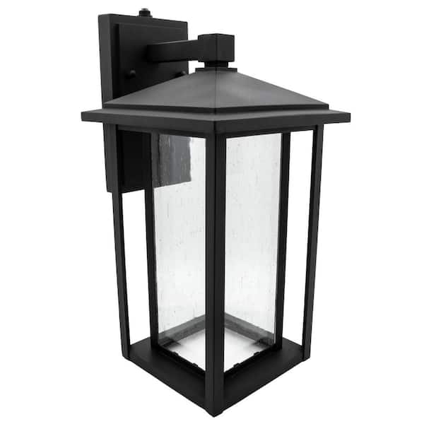 Maxxima 1-Light Black LED Outdoor Wall Lantern Sconce with Seeded Glass and Dusk to Dawn Sensor