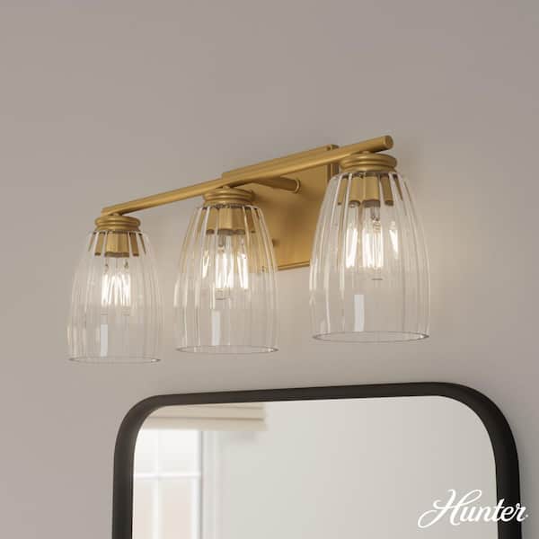 Hunter Rossmoor 20.5 in. 3-Light Luxe Gold Vanity Light with Clear Glass Shades