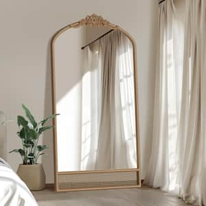 37 in. W x 71 in. H Wood Bottom Rattan Carved Arch Hanging Mirror Glam Classic Wood Color Wall Mirror